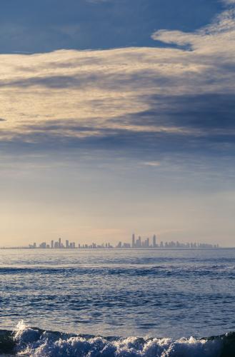 Cityscape across the water. - Australian Stock Image