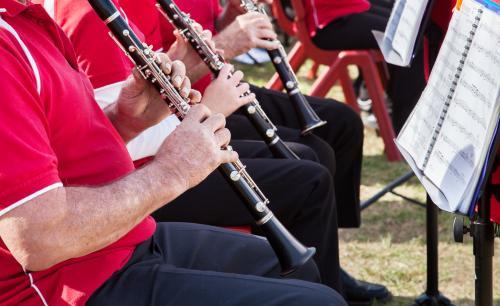 Clarinet players performing in an outdoor band - Australian Stock Image