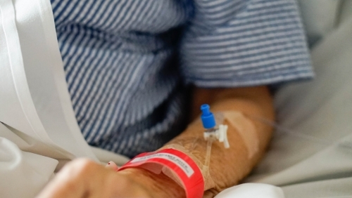 Close of IV in patients arm - Australian Stock Image