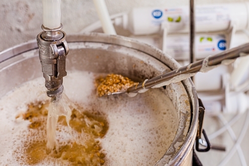 Close-up of a beer mashing procedure. - Australian Stock Image