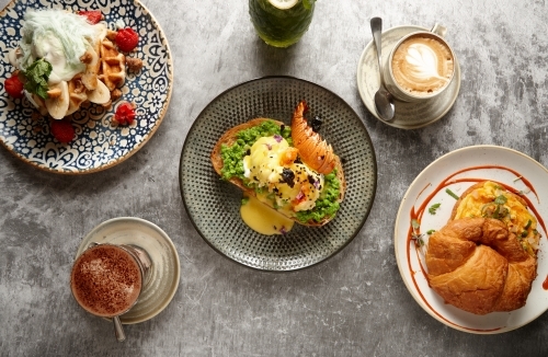 Close up of big breakfast dish on table - Australian Stock Image
