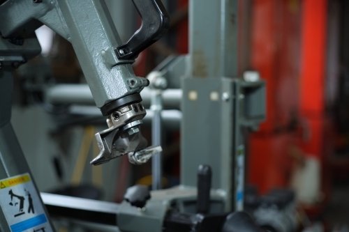 Close-up of tire changer machine - Australian Stock Image