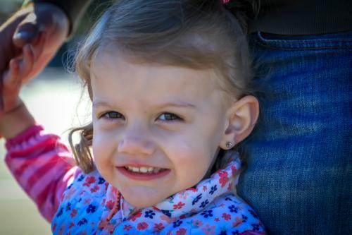 close up of young girl smiling - Australian Stock Image