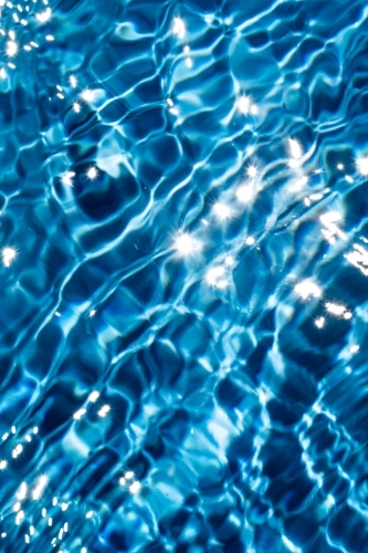 Close-up reflection of light on water surface - Australian Stock Image