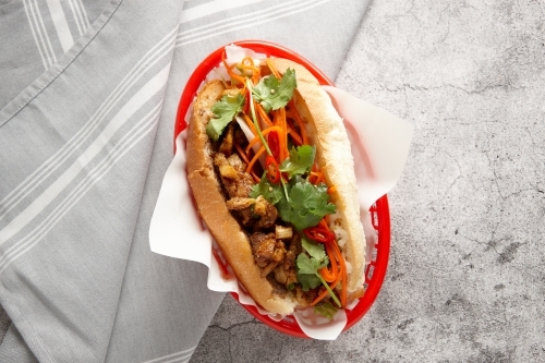 close up shot of a lemon grass chicken roll - Australian Stock Image