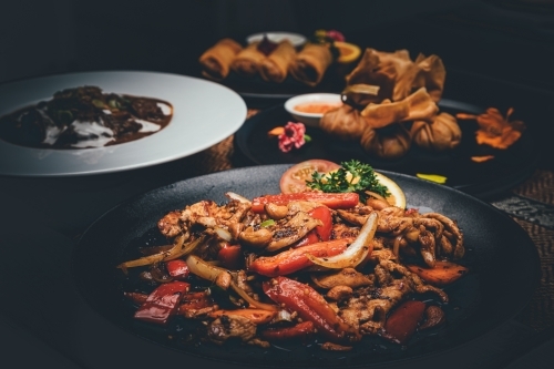 Close up shot of various Asian dishes. - Australian Stock Image