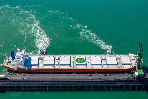 Coal ship docking at RG Tanna wharf - Australian Stock Image