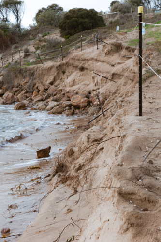 Coastal erosion against Fleurieu Peninsula Conservation Park - Australian Stock Image