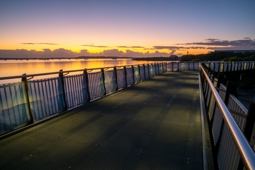 Coastal walkway bridge at sunrise / blue hour - Australian Stock Image