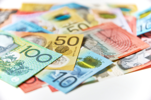 Collection of Australian banknotes scattered on a flat surface - Australian Stock Image