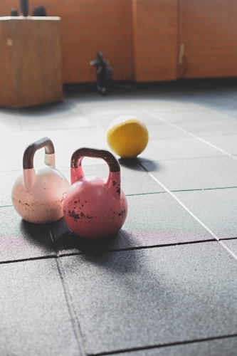 Colourful weights in an indoor gym - Australian Stock Image