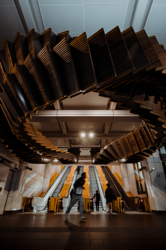 Commuters using the escalators at Wynyard Station - Australian Stock Image