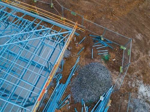 Concrete slab & metal framework of residential house under construction - Australian Stock Image