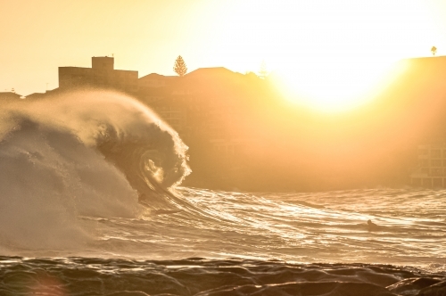 Curly wave with paddleboard - Australian Stock Image