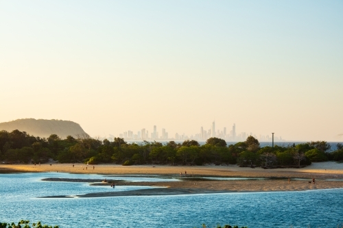 Currumbin Creek and Gold Coast high rise buildings - Australian Stock Image