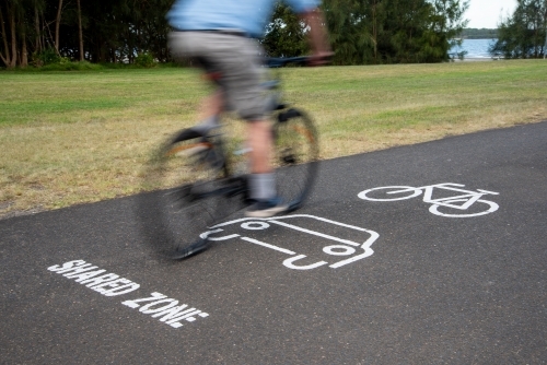 Cycle path shared zone with bike rider - Australian Stock Image