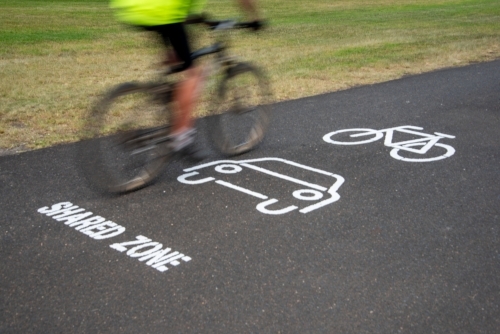 Cycle path shared zone with cyclist - Australian Stock Image