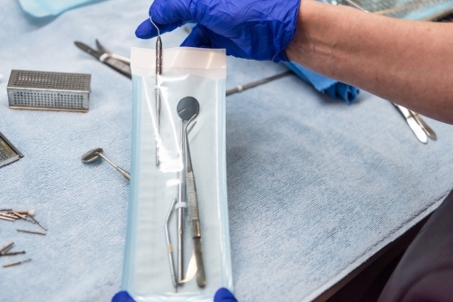 Dental instruments ready to be autoclaved - Australian Stock Image