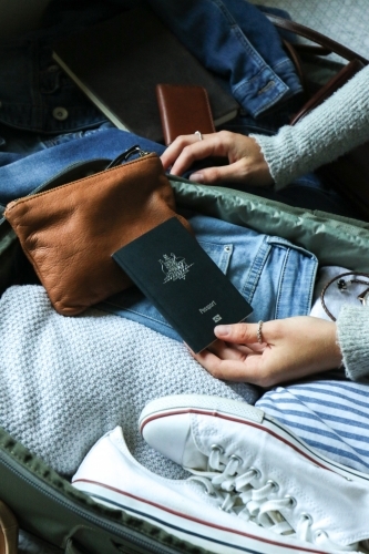 Detail of a bag being packed ready for travel - Australian Stock Image