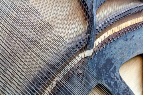 Detail of strings on the back of a piano - Australian Stock Image