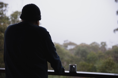 Drinking coffee on the balcony - Australian Stock Image