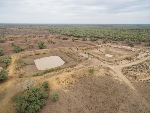 Drone image of 2 dams, 1 full, 1 empty - Australian Stock Image
