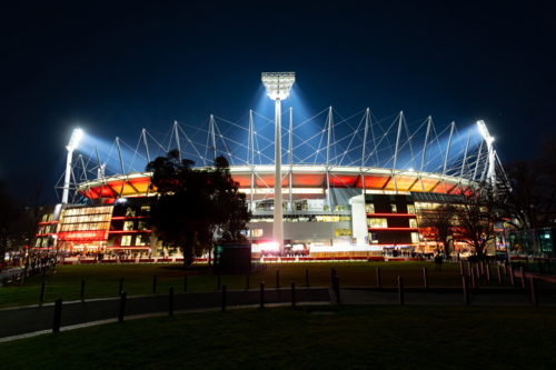 Dusk view of Melbourne's famous skyline and Melbourne Cricket Ground stadium in Melbourne, Victoria, - Australian Stock Image