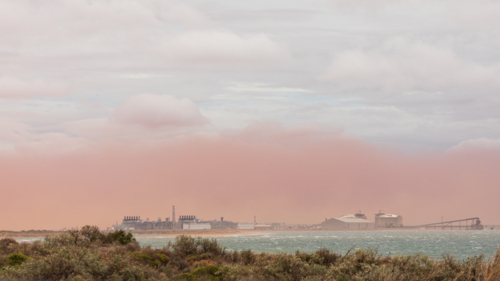 Dust storm rolling in at the start of tropical cyclone Sean - Australian Stock Image