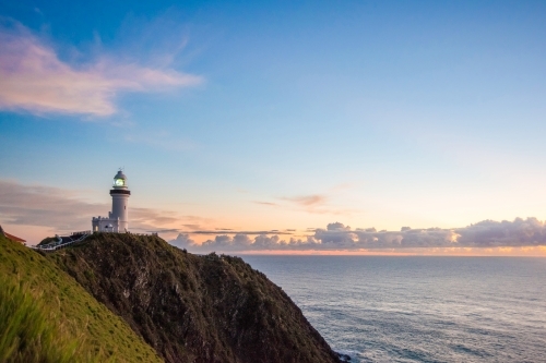 Early morning dawn showing Byron Bay lighthouse and coastline - Australian Stock Image