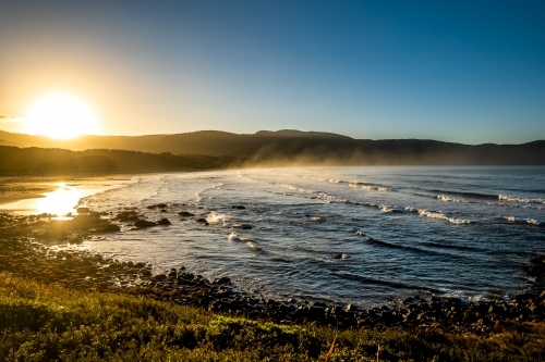 Early morning misty beach scene - Australian Stock Image