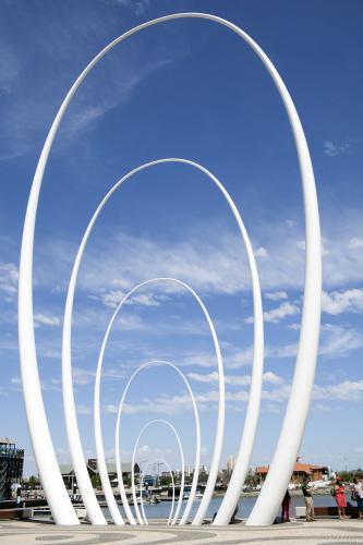 Elliptical sculpture against the sky - Australian Stock Image