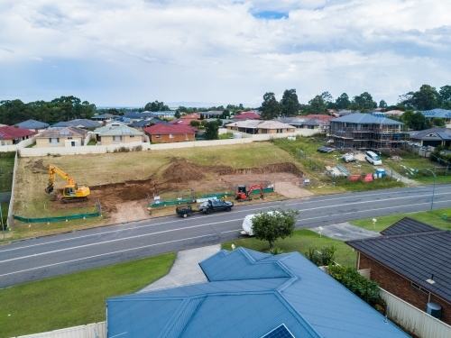 empty lot under construction in residential neighbourhood - Australian Stock Image
