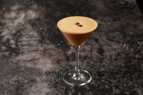 Espresso martini on table - Australian Stock Image