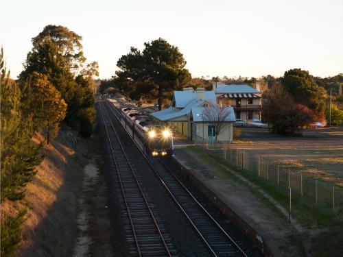 Evening rural train stopped at a railway station - Australian Stock Image