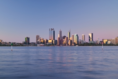 Evening view of the skyline of Perth, Australia, across the Swan River - taken in 2021 - Australian Stock Image