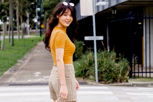 fashionable young woman in the street - Australian Stock Image