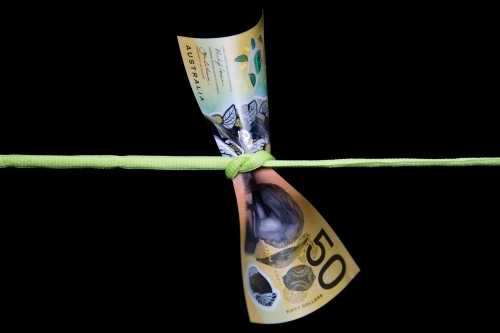 Fifty Dollars Tied in a Knot - Australian Stock Image