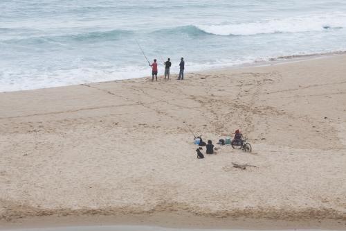 Fishermen fishing off the Great Ocean Road - Australian Stock Image