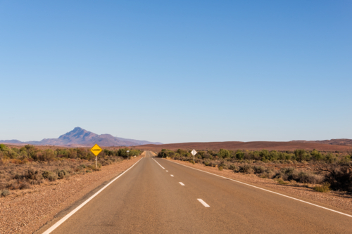 Floodway road sign on side of road, Flinders Ranges, South Australia - Australian Stock Image