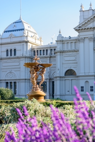 Fountain in garden with Royal Exhibition Building - Australian Stock Image