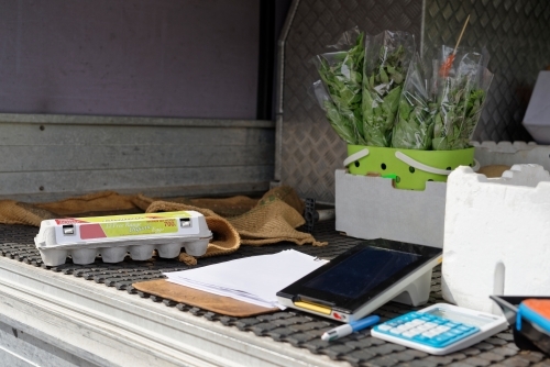 Fresh produce and electronics displayed in the back of the ute or car - Australian Stock Image