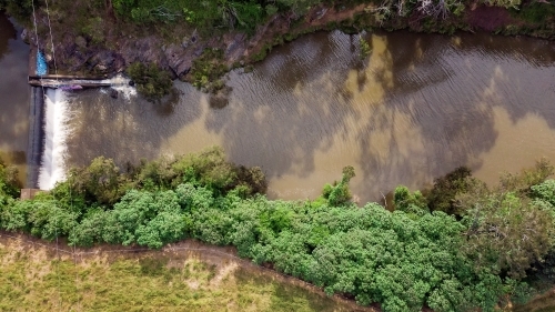 Fresh water Weirs across the river - Australian Stock Image