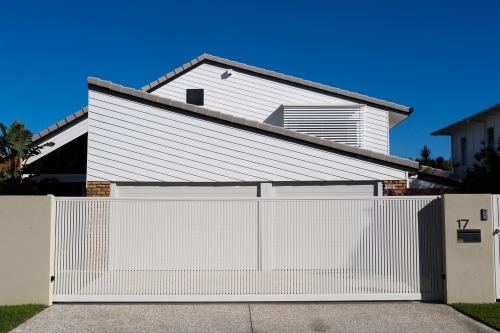 Garage gateway and driveway to a modern coastal home - Australian Stock Image