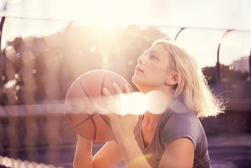 Girl training with ball - Australian Stock Image