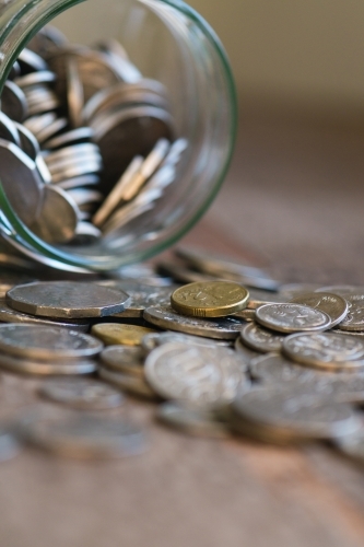 glass jar filled with Australian money - Australian Stock Image