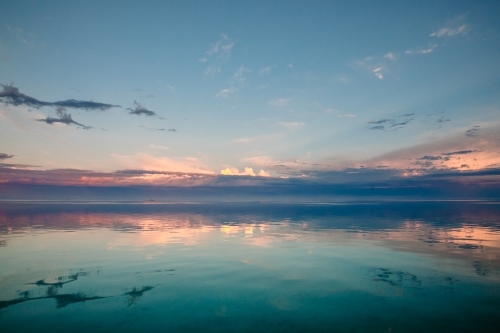 Glassy sunrise on the ocean