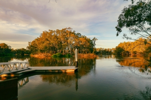 golden afternoon at the Koondrook jetty on the Gunbower Creek in Victoria, Australia - Australian Stock Image