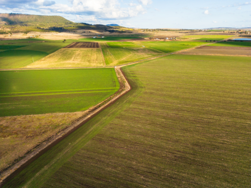 Golden green and brown agricultural fields in south east Queensland - Australian Stock Image
