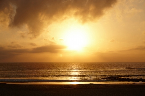 Golden sunrise over seascape - Australian Stock Image