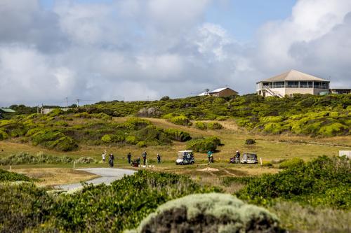 Golfers prepare to tee off at the Currie Golf Course - Australian Stock Image